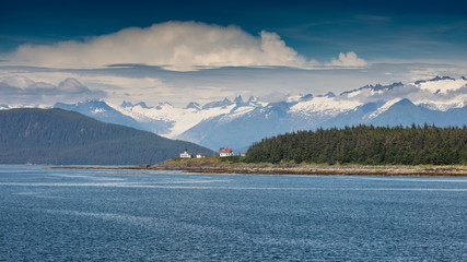 Point Retreat Lighthouse at the far northern section of Admiralty Island a few miles north of Juneau, Alaska