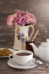 Cup of Tea on a Distressed Wood Table