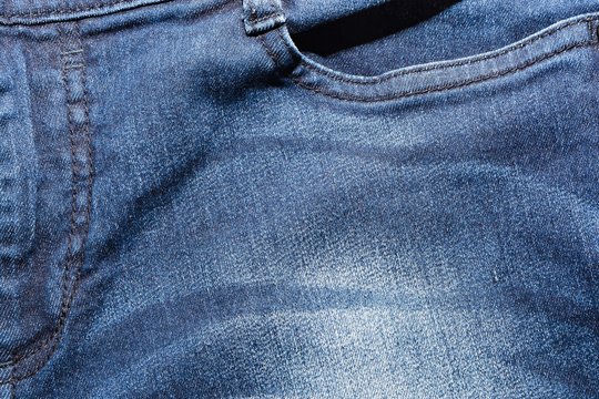 The texture is denim with a pocket   