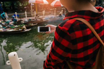 Woman using cellphone at outdoor