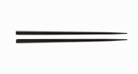 Black chopsticks isolated on white background.