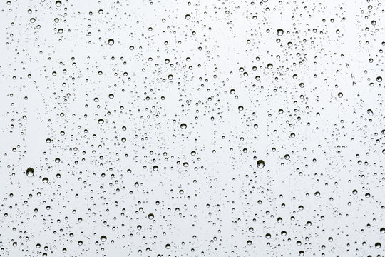 Raindrops On A Window On A Cloudy Day