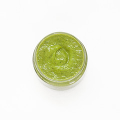 Green smothie isolated on white background. Flat lay, top view