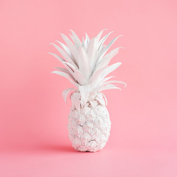 White pineapple on pink  pastel color background.creativity and inspiration concepts