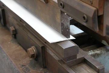 working bending metal sheet by high precision metal sheet bending machine.