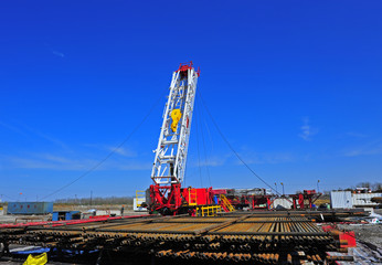 Fototapeta na wymiar Oil field oil workers at work
