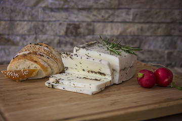 Table decoration of different flavors of cheese