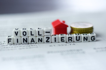 Obraz premium German Word FULL FUNDING formed by alphabet blocks: Vollfinanzierung