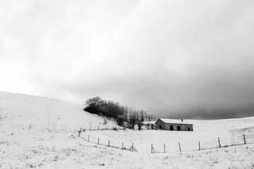 A small mountain retreat covered by snow on Mt. Subasio (Umbria, Italy) during winter season