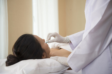 Woman in an acupuncture therapy