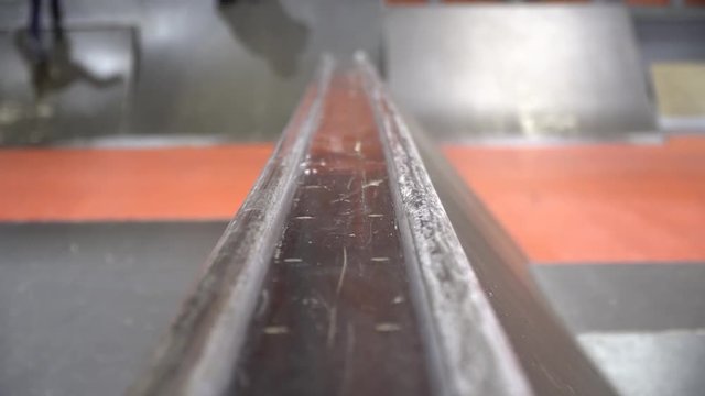 Montage as men on rollers learn to do grind in a skate park and fall