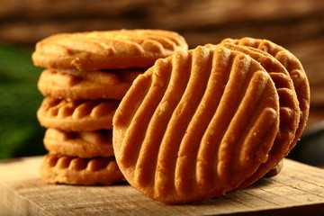 Stack of almond ,cashew cookies on a rustic background.
