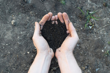 Handful of Rich Brown Soil