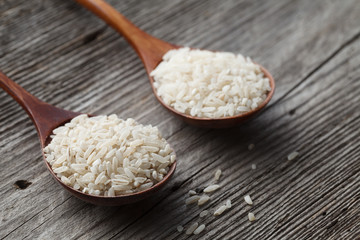 Some rough rice in spoon, close-up