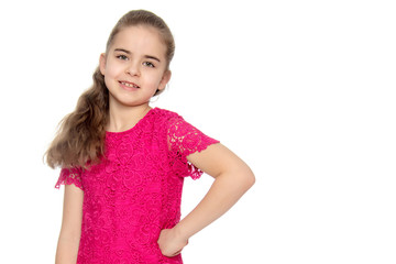 Beautiful little girl in a red dress.