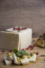 Table decoration of different flavors of cheese