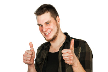 Young guy with beard and modern hairstyle mohawk, shows thumbs up isolated on white background.