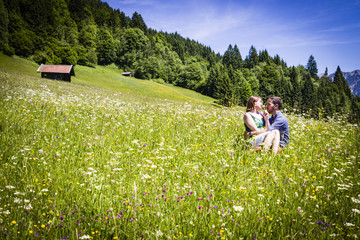 Fototapeta na wymiar happy lovers on Holiday in the alps mountains