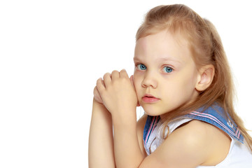 The little girl thinks.