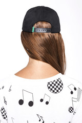 woman stand up wearing clothes and cap isolated white background.