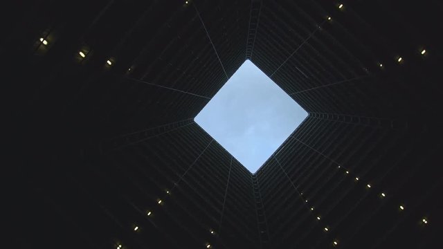 looking up futuristic modern skyscraper high rise building in Hong Kong, China 