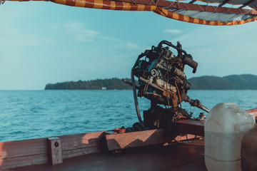 A close-up of a motor engine on a Cambodian longtail boat 