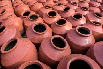Pots going through drying process at production place in India. Traditional pottery is a an art and in practice since ancient time.