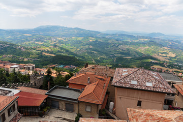 Fototapeta na wymiar landscape with roofs of houses in small tuscan town in province, Italy