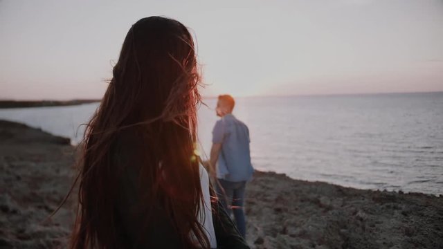 Loving happy and very beautiful couple walking in nature 