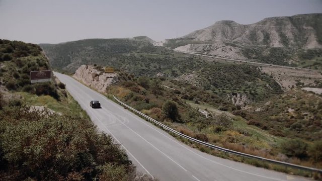 car on mountain road 