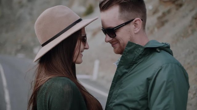 Loving happy and very beautiful couple walking in nature 