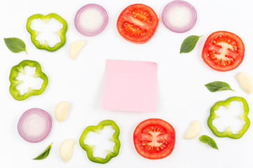 Top view of sticky notes with vegetables Isolated on a white background