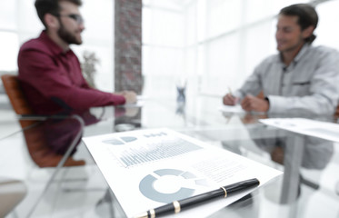 business partners discuss the marketing scheme