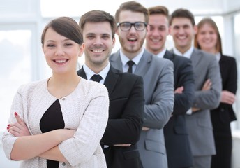 group of business people with female leader in front