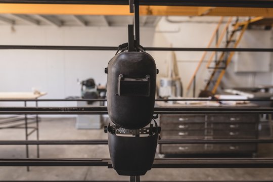 Welding helmets in workshop