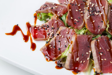 grilled seared tuna served with teriyaki sauce