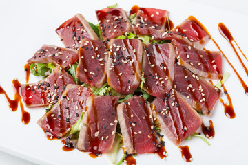 grilled seared tuna served with teriyaki sauce
