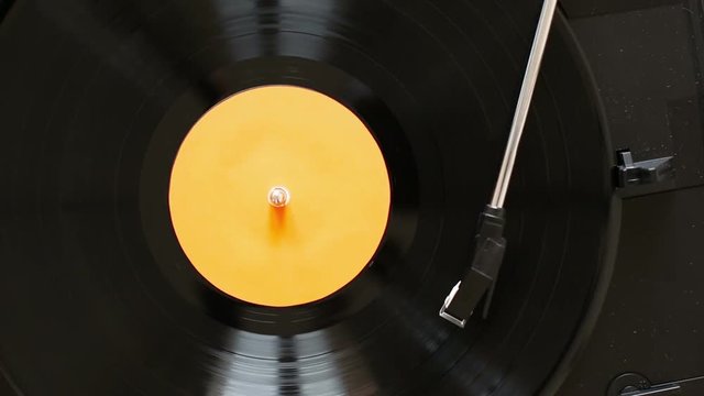 Close up of turntable playing vinyl record