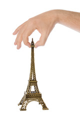 Paris Eiffel tower souvenir in hand