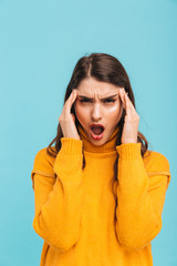 Portrait of an irritated young girl in sweater