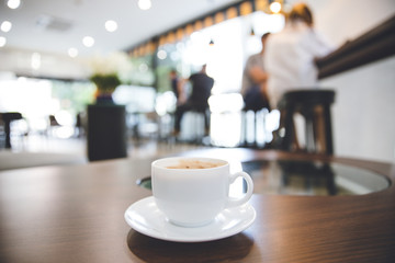 cup of coffee on table in cafe or restaurant