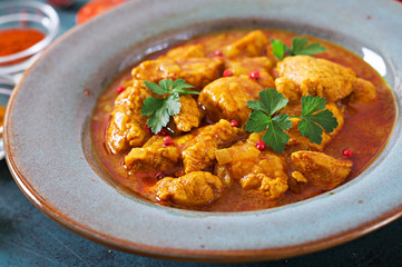 Curry with chicken and onions. Indian food. Asian cuisine.