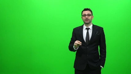 Businessman Presenting in Front of a Green Screen. Right Side.