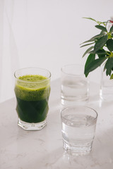 Healthy green smoothie. Natural, organic healthy juice in bottle for weight loss diet
