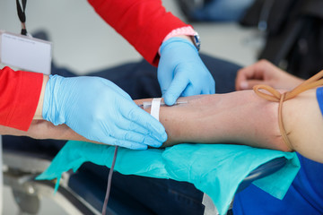 Blood donor at donation.
