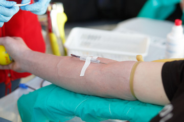 Blood donor at donation.
