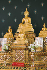 Fototapeta na wymiar Golden buddha statue