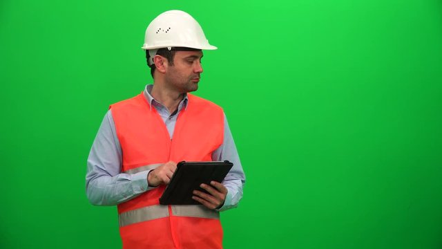 Engineer or Architecture Making Presentation with Tablet on Digital Screen. Left Side.