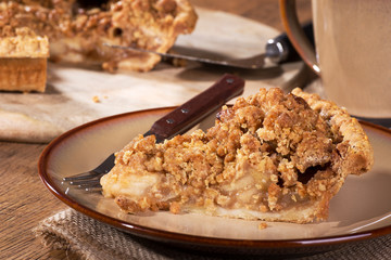 Slice of Dutch apple pie on a plate