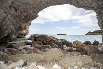 View of the bay from a cave along the stony beach, Marina di Camerota, Italy